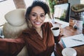 Portrait of elegant attractive recruiter lady sit chair make selfie hand hold fresh aroma coffee mug workplace indoors