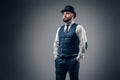 Elegant male in cylinder hat and waistcoat. Royalty Free Stock Photo