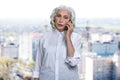 Portrait of elegant senior woman talking on mobile phone. Royalty Free Stock Photo