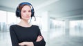 Portrait of an elegant woman with headset. Customer support concept Royalty Free Stock Photo