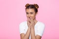 Young woman on pink background Attractive beautiful woman showing air kiss Royalty Free Stock Photo