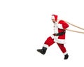 Portrait of emotive senior man in image of Santa Claus pulling something with rope isolated over white background Royalty Free Stock Photo