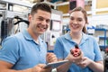 Portrait Of Engineer And Apprentice Examining Component In Factory Royalty Free Stock Photo