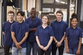 Portrait Of Engineer And Apprentices In Factory Royalty Free Stock Photo