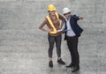 Portrait of engineer on cement background