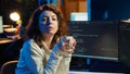 IT admin enjoying hot beverage while increasing data security