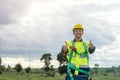 portrait engineer male worker with hardhat safety equipment standing hapy smiling thumbs up for job done