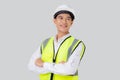 Portrait engineer young asian man wearing helmet standing and smiling with confident isolated.