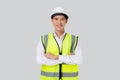 Portrait engineer young asian man wearing helmet standing and smiling with confident isolated. Royalty Free Stock Photo