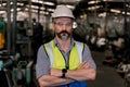 Portrait of Engineering wearing helmet and safety unifrom in factory. Industrial and worker