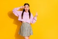 Portrait of enthusiastic funky crazy girl enjoy spring holiday free time make v-sign wear plaid clothes isolated over Royalty Free Stock Photo