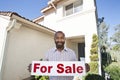 Portrait Of An Estate Agent Holding ~For Sale~ Sign Royalty Free Stock Photo