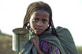 Portrait of Ethiopian girl fetching water