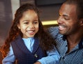 Portrait of ethnic father and cute little daughter Royalty Free Stock Photo