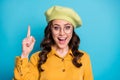 Portrait of excited astonished positive girl raise index finger up have wonderful thoughts wear good look clothes Royalty Free Stock Photo