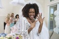 Portrait Of An Excited Bride Showing Her Engagement Ring