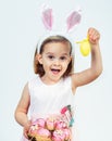 Easter kid holding egg decoration