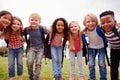 Portrait Of Excited Elementary School Pupils On Playing Field At Break Time Royalty Free Stock Photo