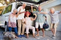 Portrait Of Excited Senior Friends Loading Luggage Into Trunk Of Car About To Leave For Vacation Royalty Free Stock Photo