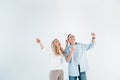 Portrait of excited stylish mature man and woman