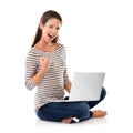 Portrait, excited and woman celebrate on laptop for good news, success or goal in studio isolated on a white background