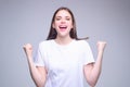 Portrait of excited woman. Wow, omg. Excited girl opening mouth widely. Woman with excited amazed expression face Royalty Free Stock Photo