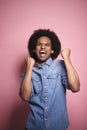 Portrait of excited young African man raising his fists Royalty Free Stock Photo