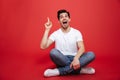 Portrait of an excited young man in white t-shirt Royalty Free Stock Photo