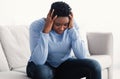Tired black woman touching her head feeling stress Royalty Free Stock Photo