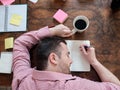 Portrait of exhausted worker sleeping