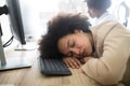 Portrait of an exhausted business woman sleeping at work Royalty Free Stock Photo