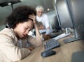 Portrait of an exhausted business woman sleeping at work Royalty Free Stock Photo