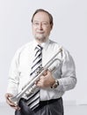 Portrait.experienced teacher of music with a trumpet