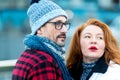 Portrait of expression couple talked on street. Couple looked at strangers. Royalty Free Stock Photo