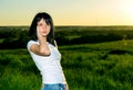 Portrait of expressive beautiful woman against sunset Royalty Free Stock Photo