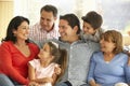 Portrait Of Extended Hispanic Family Relaxing At Home Royalty Free Stock Photo