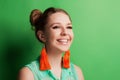 Portrait f a cheerful young girl in bright casual clothes smiling at the camera with beautiful smile. Colorful background Royalty Free Stock Photo