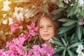 portrait face of candid beautiful little kid girl of eight years old with brown eyes on