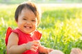 Portrait face of cute asian little girl and child happiness and fun in the park in the summer,