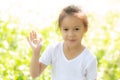 Portrait face of cute asian little girl and child happiness and fun in the park in the summer Royalty Free Stock Photo