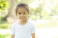 Portrait face of cute asian little girl and child happiness and fun in the park in the summer Royalty Free Stock Photo