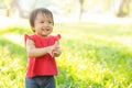 Portrait face of cute asian little girl and child happiness and fun in the park in the summer Royalty Free Stock Photo