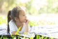 Portrait face of cute asian little girl and child happiness and fun in the park in the summer, Royalty Free Stock Photo