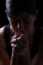 Portrait of a faithful woman praying