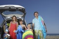 Portrait Of Family With By Car At Beach Royalty Free Stock Photo