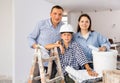 Portrait of family doing renovation at home Royalty Free Stock Photo