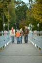 Portrait of family of four posing on bridge Royalty Free Stock Photo