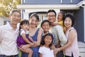 Portrait Of Family With Grandparents Standing Outside House Royalty Free Stock Photo