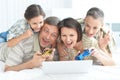 Portrait of family playing computer games at home Royalty Free Stock Photo