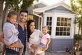 Portrait Of Family Standing Outside Home Royalty Free Stock Photo